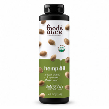 Foods Alive Organic Cold-Pressed Hemp Seed Oil 16 oz black plastic bottle with black cap and green and white label featuring hemp seeds. 