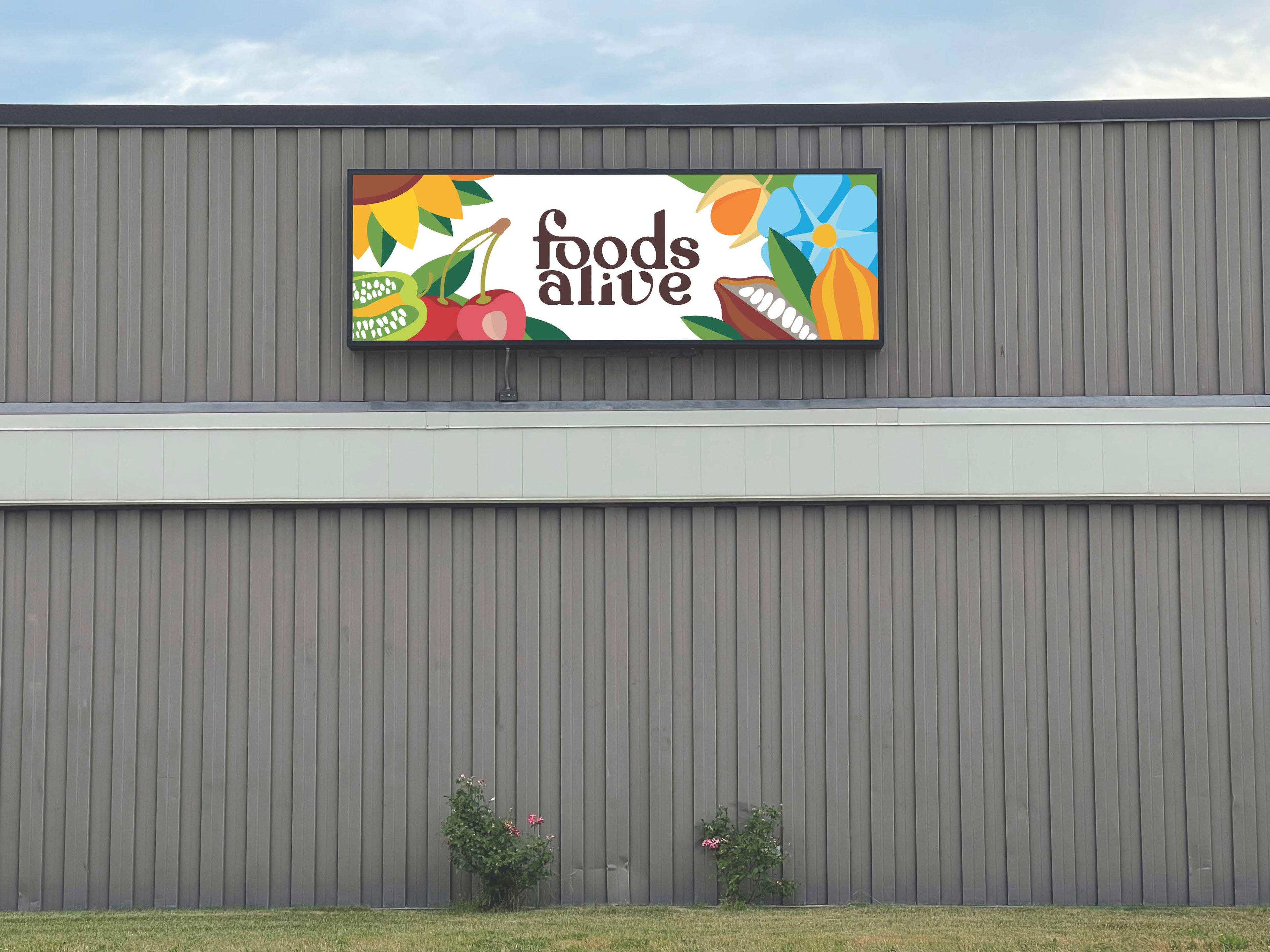 Foods Alive Sign on Building