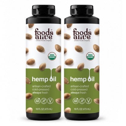 Foods Alive Organic Cold-Pressed Hemp Seed Oil 16 oz 2-pack featuring two black plastic bottles with green and white hemp seed labels. 